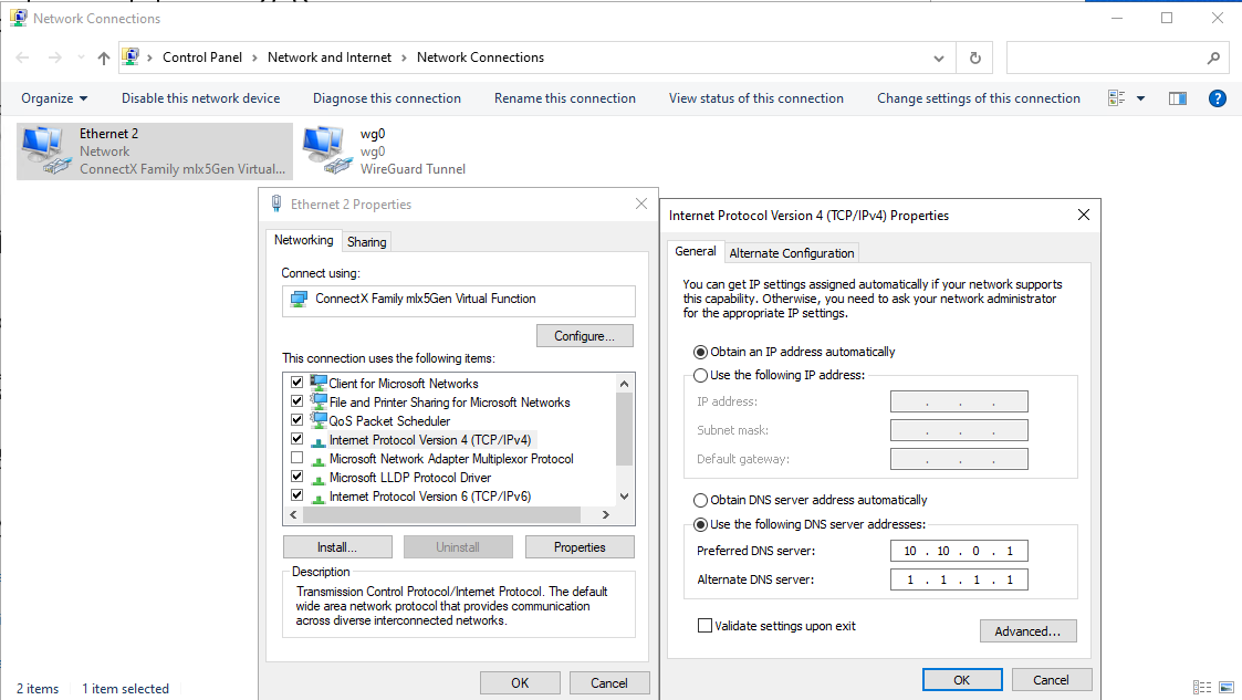 Windows IPv4 Properties on VOUGHT showing preferred DNS set to 10.10.0.1 (DC01 WireGuard IP) and alternate DNS to 1.1.1.1